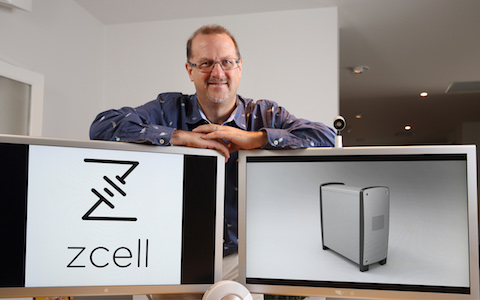 Redflow Executive Chairman Simon Hackett with ZCell enclosure on-screen